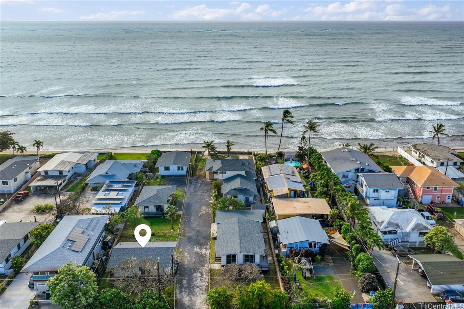 91-433 Ewa Beach Road Ewa Beach, HI 96706 - Photo 1 of 22 a view of houses with outdoor space