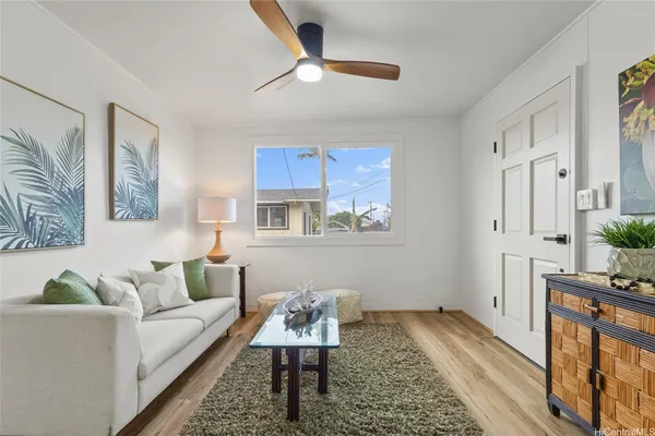 a living room with furniture and a rug