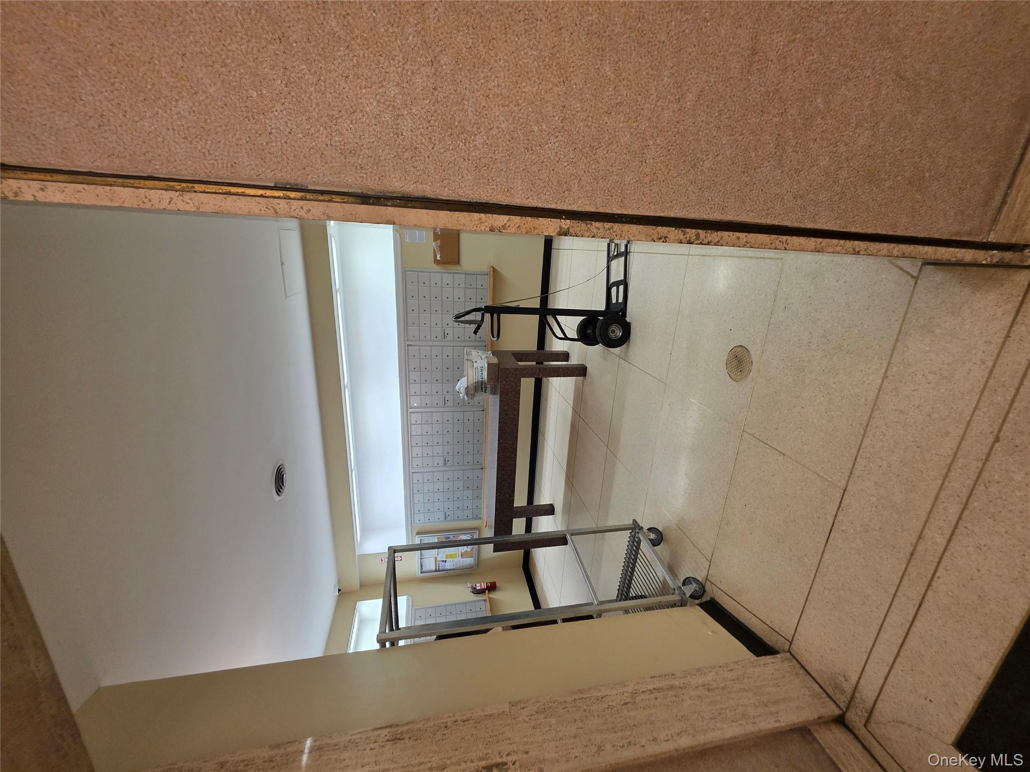 1020 Grand Concourse, Unit 17M Bronx, NY 10451 - Photo 14 of 20 a view of a hallway with stairs