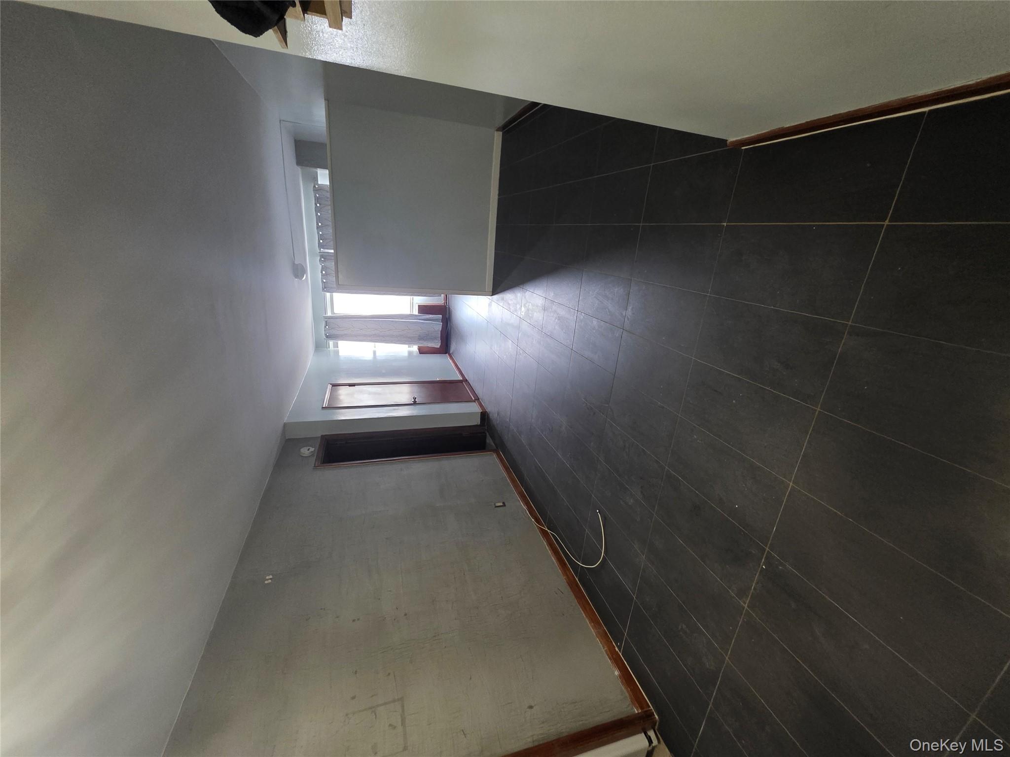 1020 Grand Concourse, Unit 17M Bronx, NY 10451 - Photo 2 of 20 a view of room and hall with wooden floor