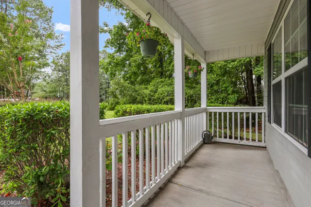 a view of a porch with a yard