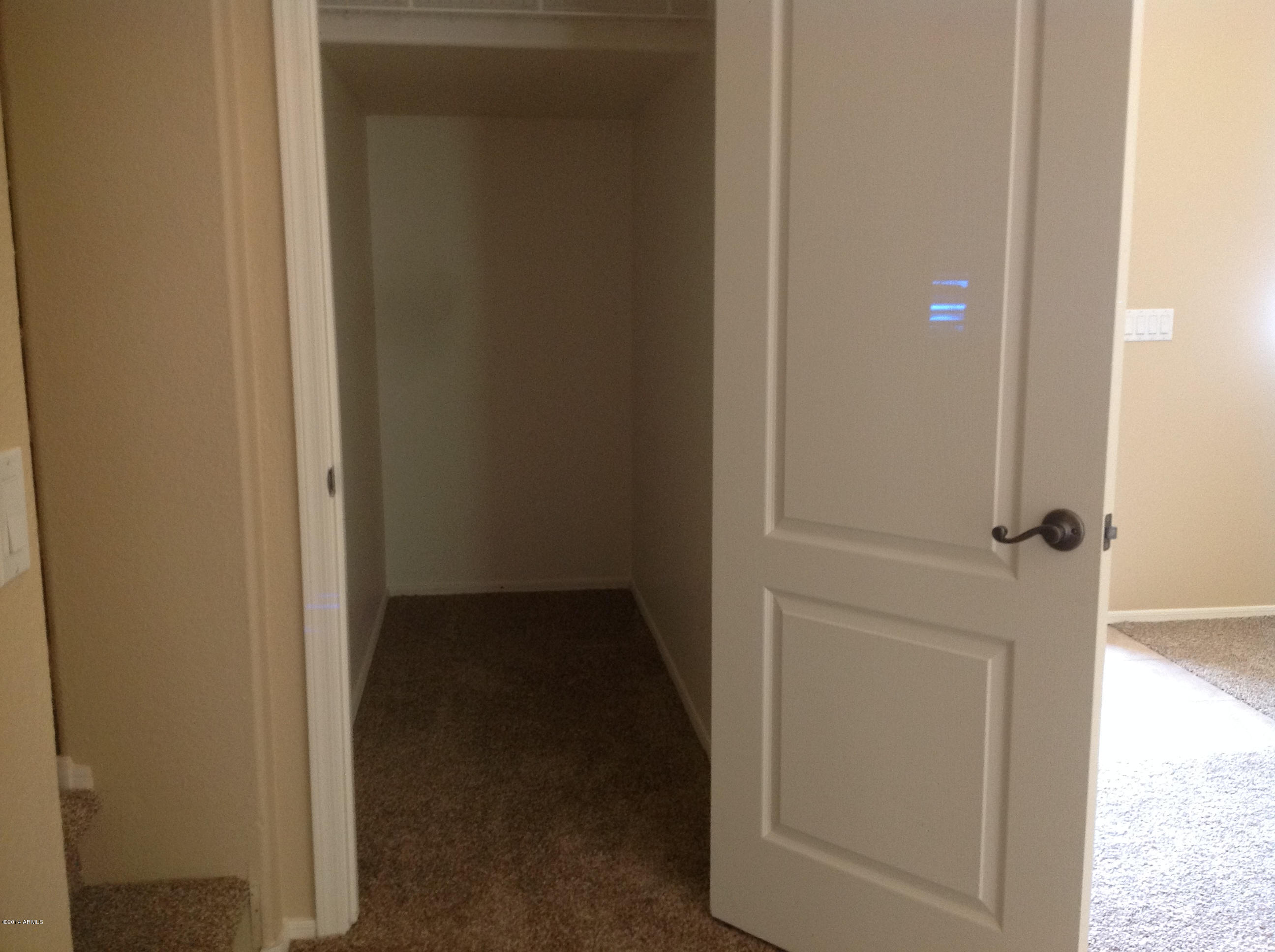 3659 East Warbler Road Gilbert, AZ 85297 - Photo 5 of 22 Under stair closet