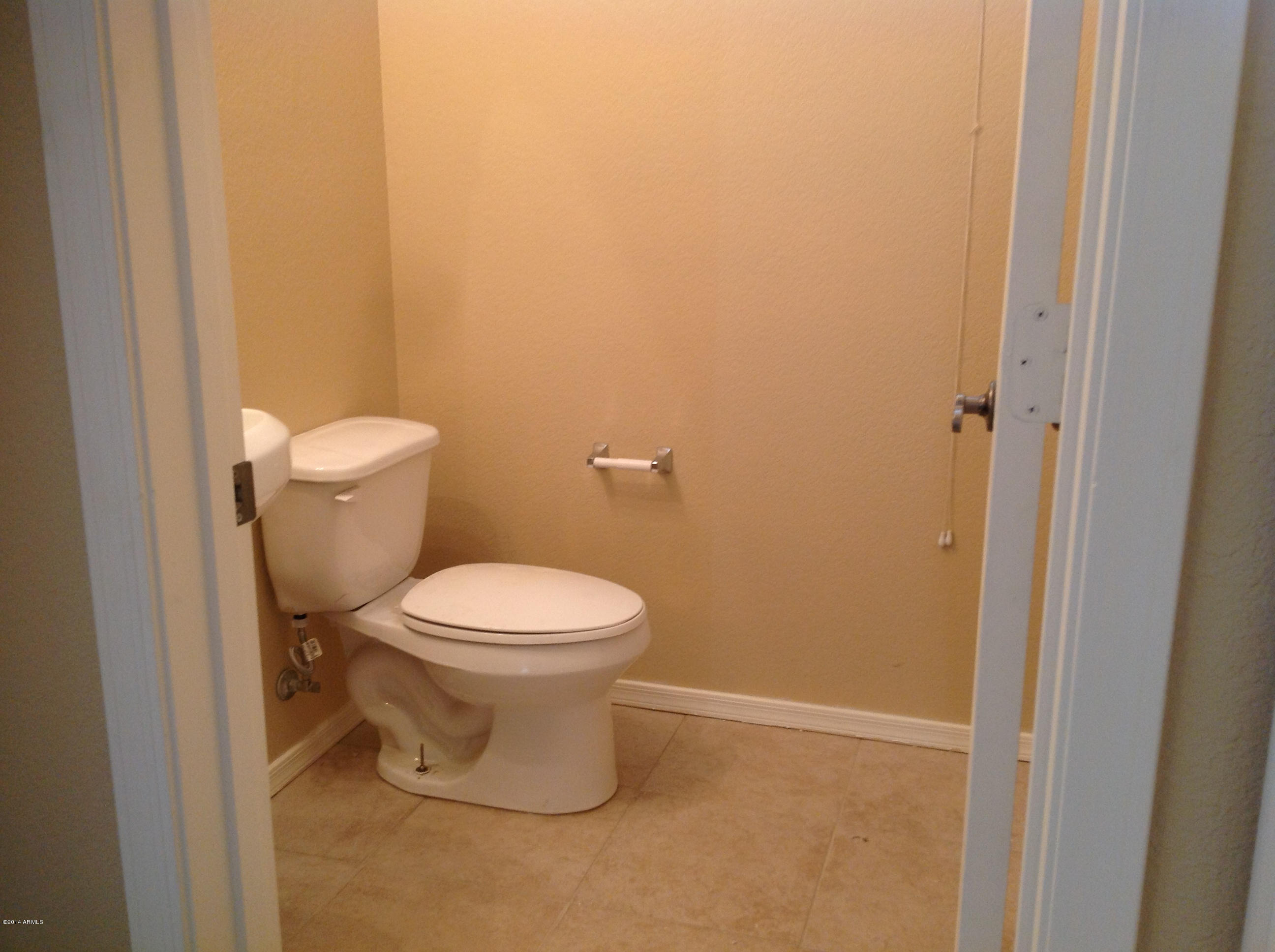 3659 East Warbler Road Gilbert, AZ 85297 - Photo 8 of 22 powder room downstairs
