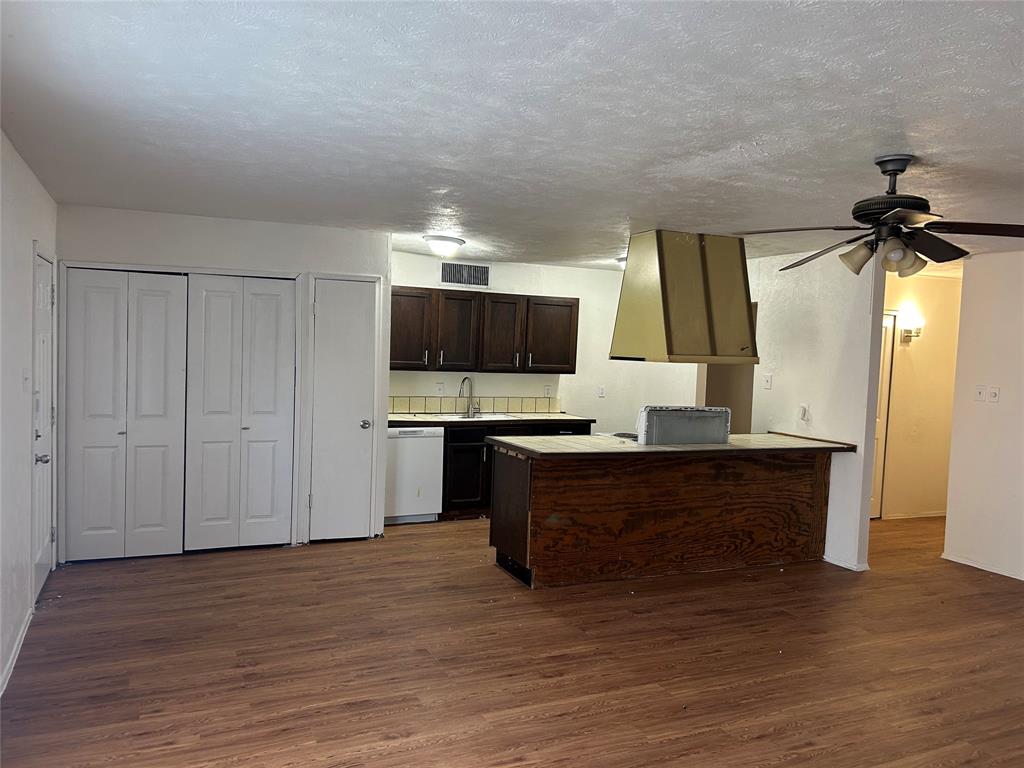 1826 Legend Drive Garland, TX 75040 - Photo 4 of 11 a living room with furniture and a flat screen tv