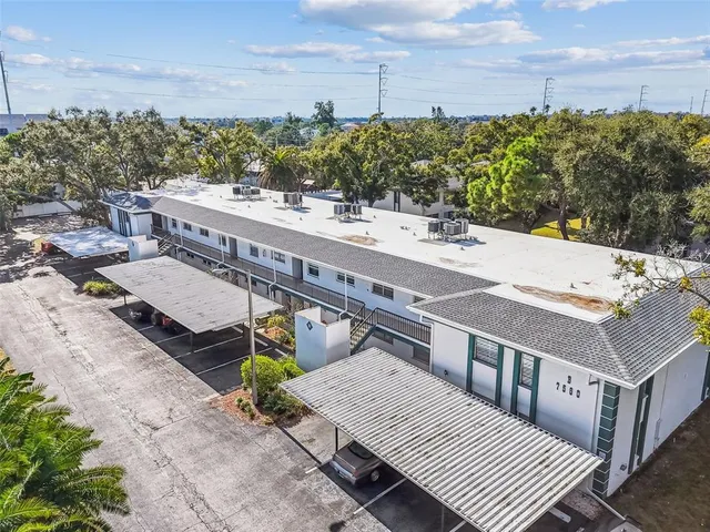 a view of a balcony with chairs