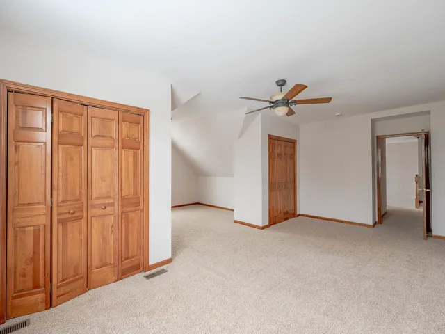 a view of a livingroom with a ceiling fan