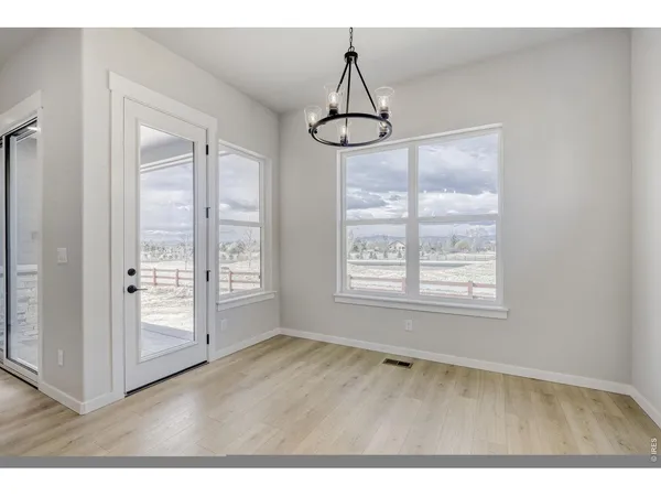a view interior of a house and wooden floor in an empty room
