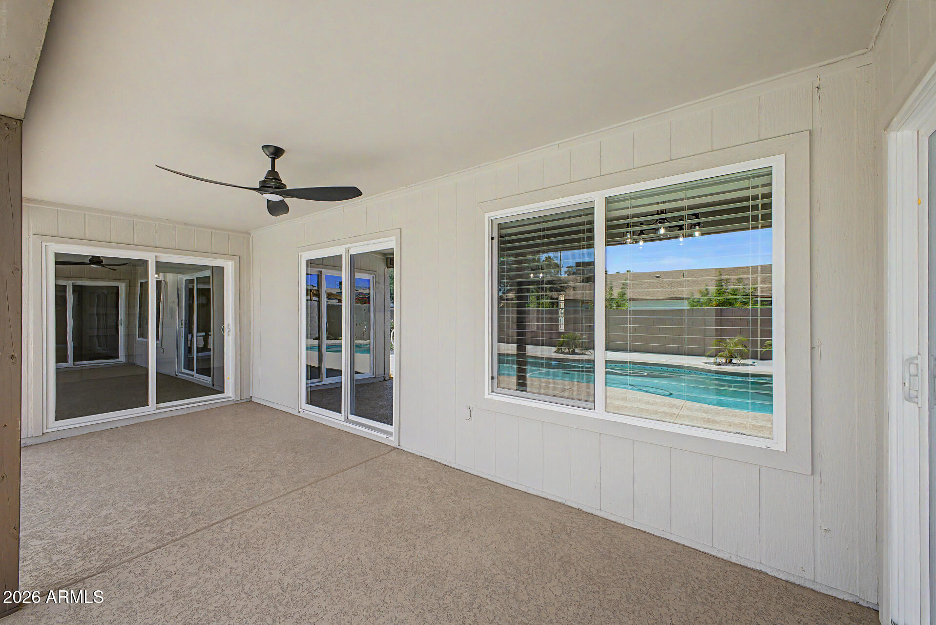 1009 West Pampa Avenue Mesa, AZ 85210 - Photo 30 of 31 a view of an empty room with a window