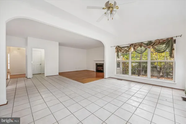a view of an empty room and window