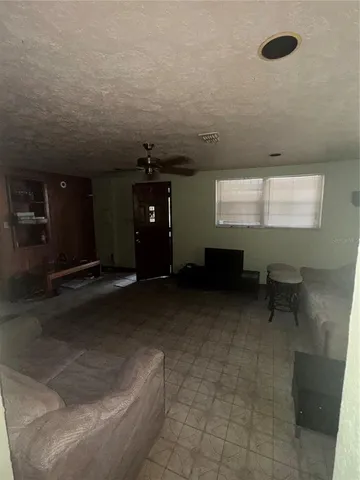 a room with furniture and a window