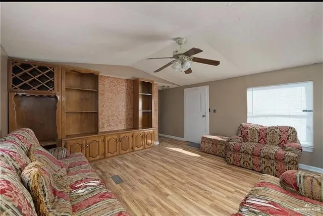 a bed room with a bed and a couch