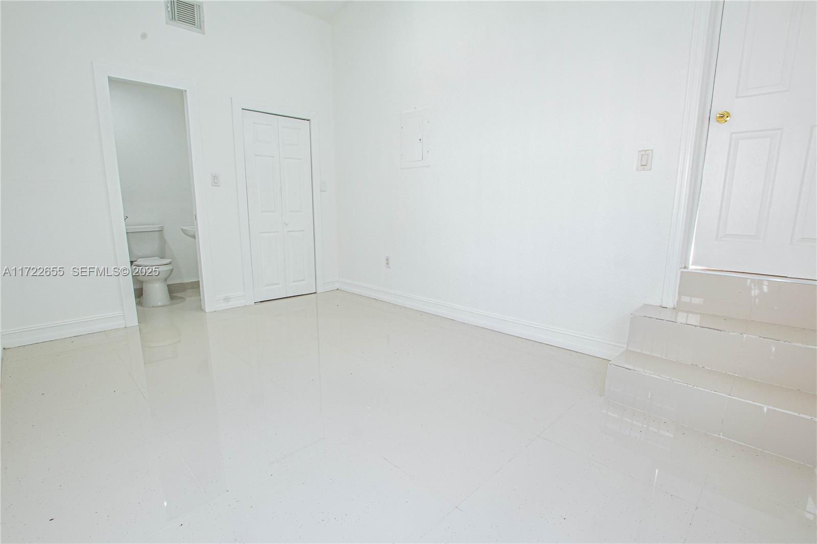 575 Northwest 49th Street Miami, FL 33127 - Photo 15 of 22 a view of an empty room