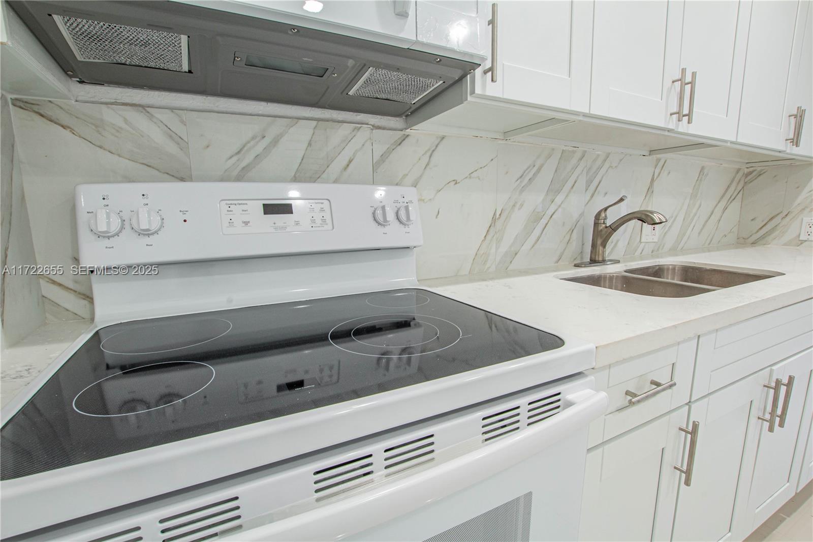 575 Northwest 49th Street Miami, FL 33127 - Photo 4 of 22 a close view of utility in a kitchen