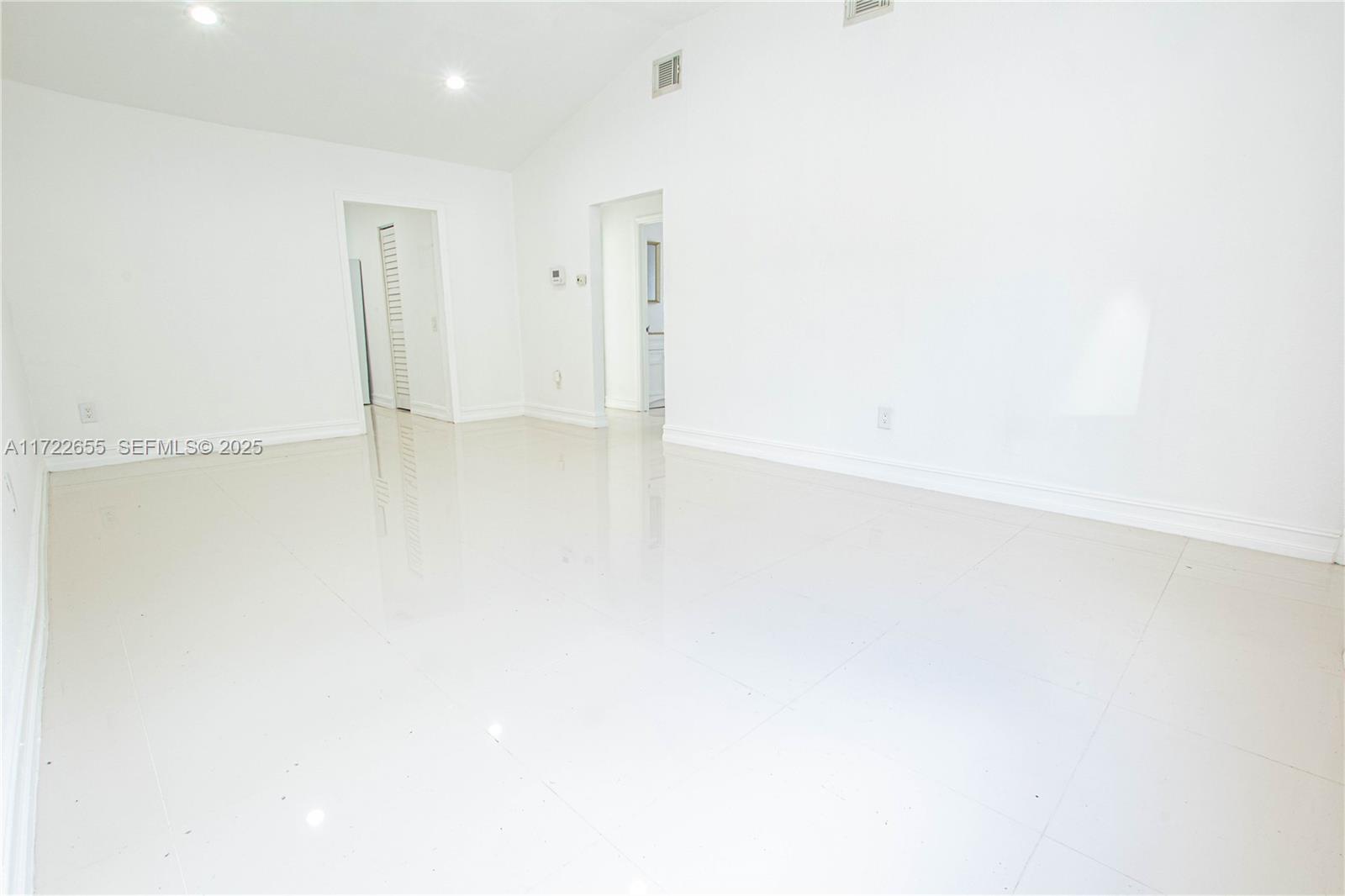 575 Northwest 49th Street Miami, FL 33127 - Photo 7 of 22 a view of an empty room