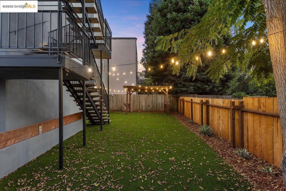 1610 Milvia Street Berkeley, CA 94709 - Photo 5 of 24 a backyard of a house with lots of green space
