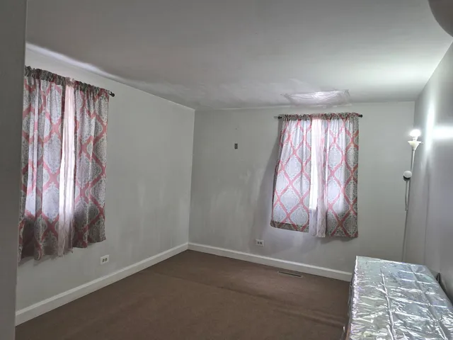 an empty room with window