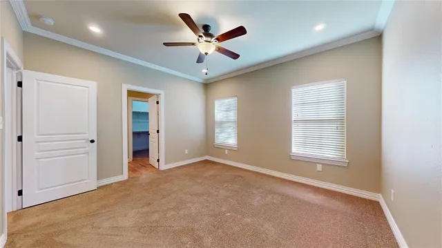 en view of an empty room with a window