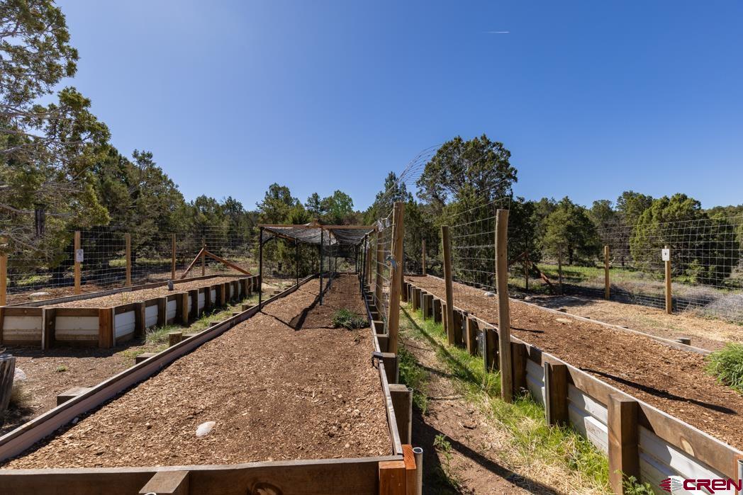 553 Cow Canyon Road Ignacio, CO 81137 - Photo 15 of 34 a view of a swimming pool with a deck