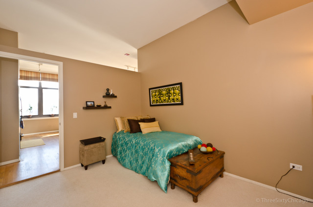 1201 West Adams Street, Unit 905 Chicago, IL 60607 - Photo 17 of 19 a living room with furniture and a window
