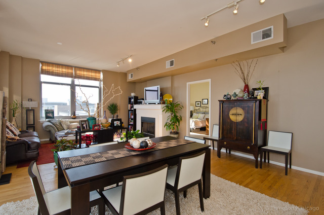 1201 West Adams Street, Unit 905 Chicago, IL 60607 - Photo 7 of 19 a view of a dining room with furniture window and outside view