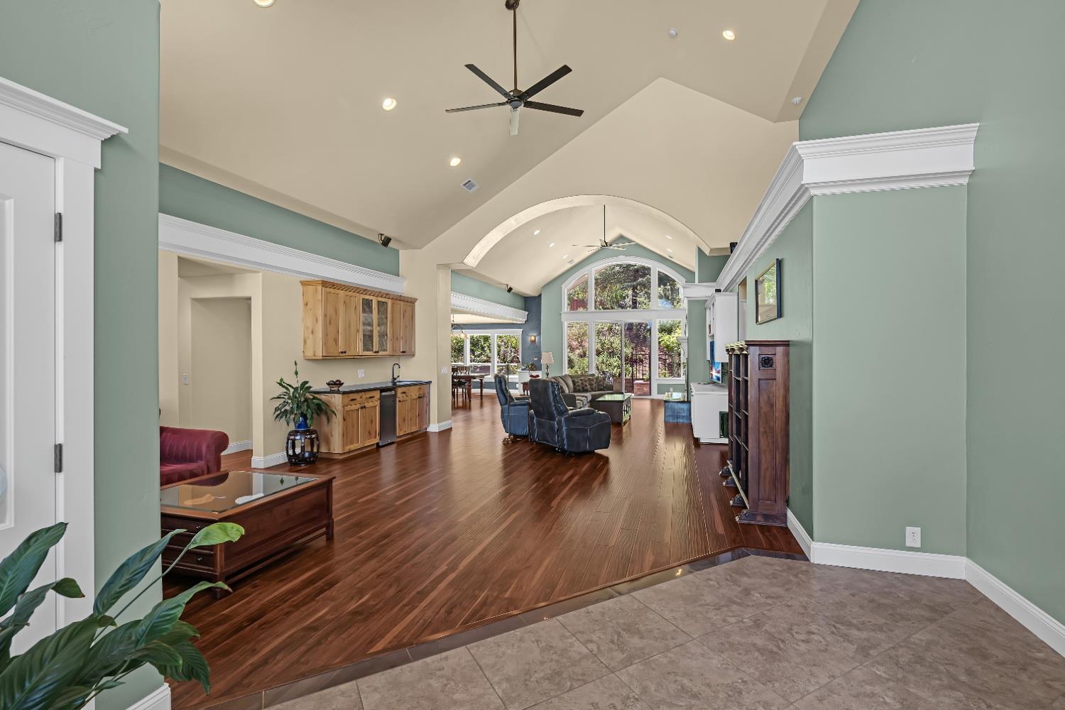 a view of a living room and dining room