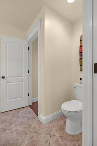 a bathroom with a tub shower and sink