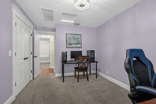 a view of a backyard with sitting area and furniture
