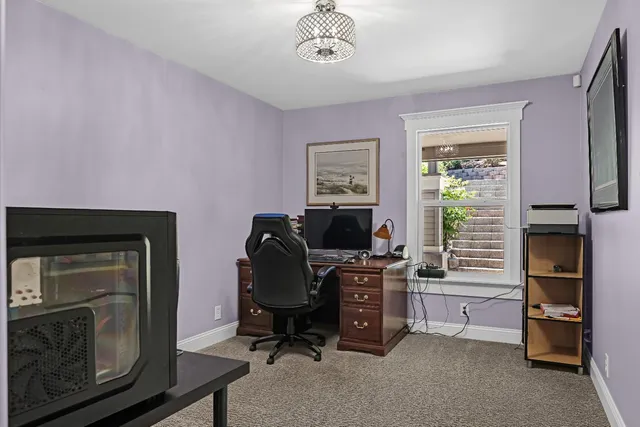 a view of a house with a potted plant