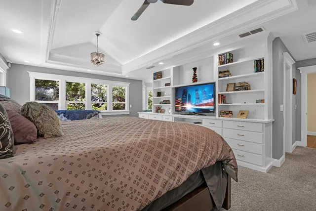 a view of a house with a small yard and plants