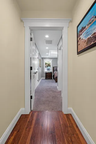 an aerial view of a house with yard
