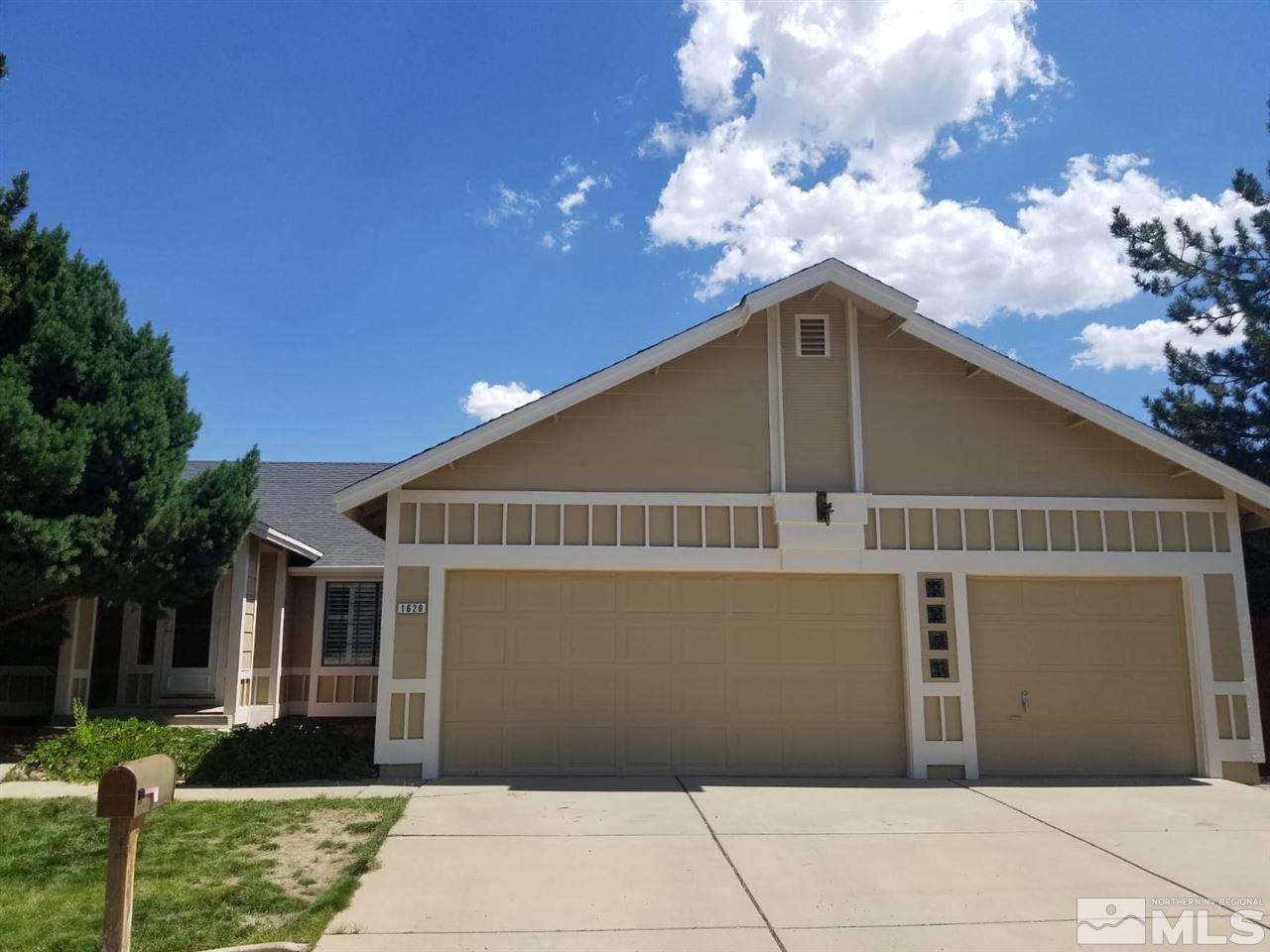 1620 Catherine Way Reno, NV 89523 - Photo 1 of 17 a front view of a house with a yard