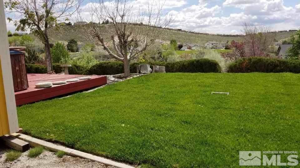 1620 Catherine Way Reno, NV 89523 - Photo 13 of 17 a view of a field of grass and trees