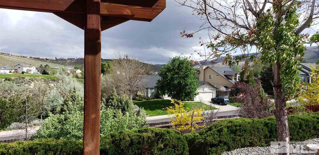 1620 Catherine Way Reno, NV 89523 - Photo 4 of 17 a view of a garden with a building in the background