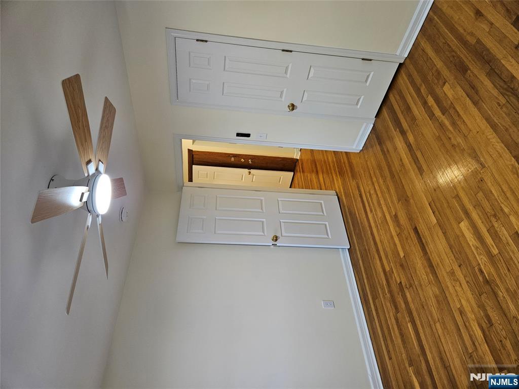 581 High Mountain Road, Unit 1 North Haledon, NJ 07508 - Photo 4 of 9 a view of an empty room with wooden floor