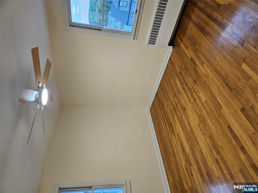 581 High Mountain Road, Unit 1 North Haledon, NJ 07508 - Photo 5 of 9 a view of empty room with wooden floor