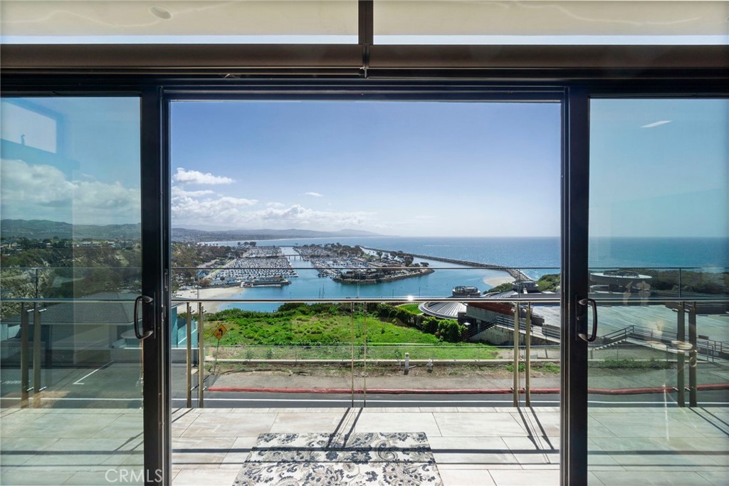 34403 Street Of The Green Lantern, Unit 2 Dana Point, CA 92629 - Photo 2 of 38 a view of a glass door