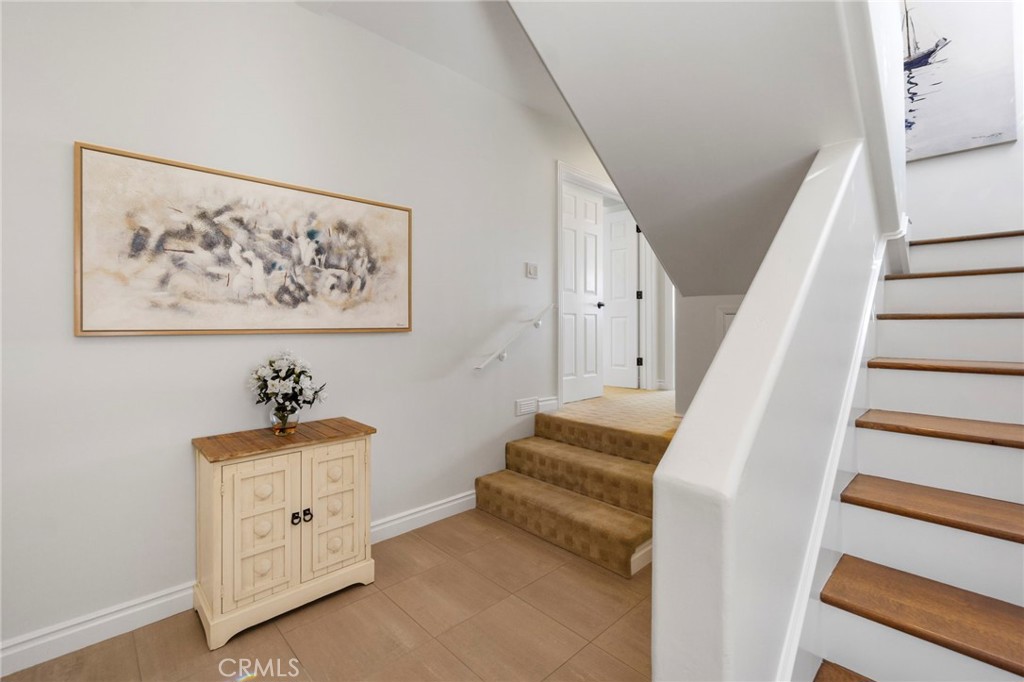 34403 Street Of The Green Lantern, Unit 2 Dana Point, CA 92629 - Photo 24 of 38 a view of a hallway with stairs