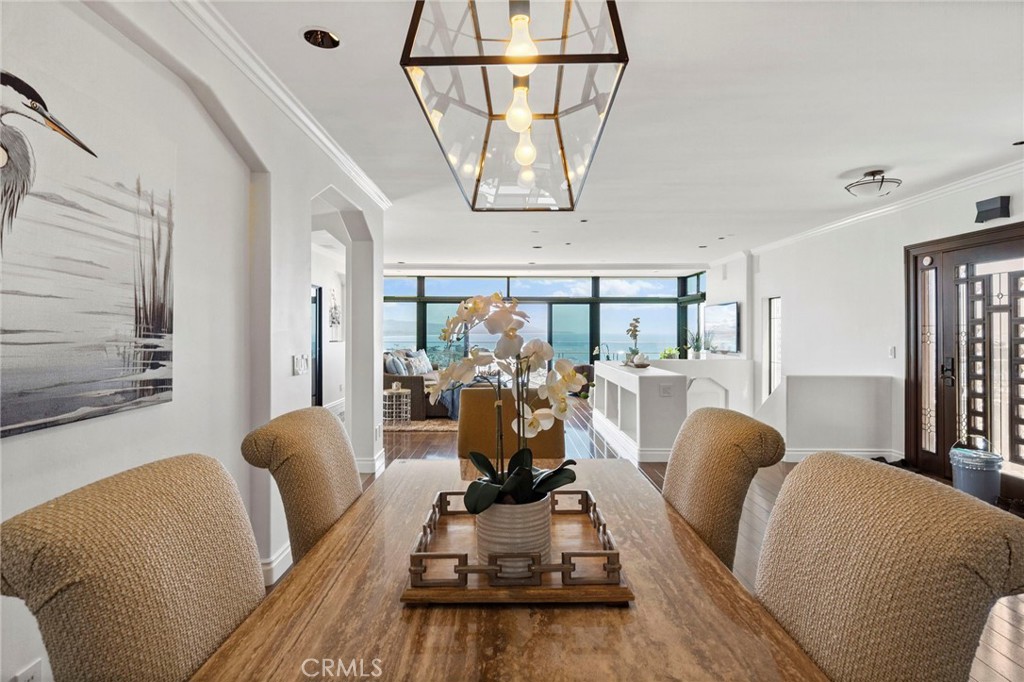 34403 Street Of The Green Lantern, Unit 2 Dana Point, CA 92629 - Photo 10 of 38 a view of a livingroom with furniture and windows