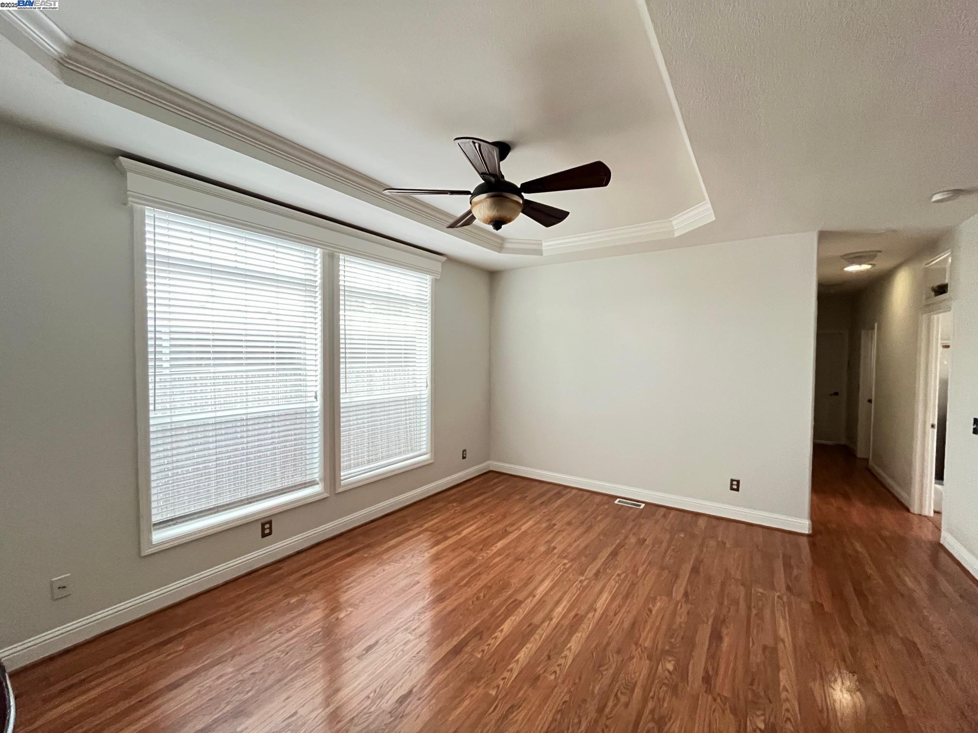 29043 Windemere Road Hayward, CA 94544 - Photo 2 of 8 wooden floor in an empty room with a window