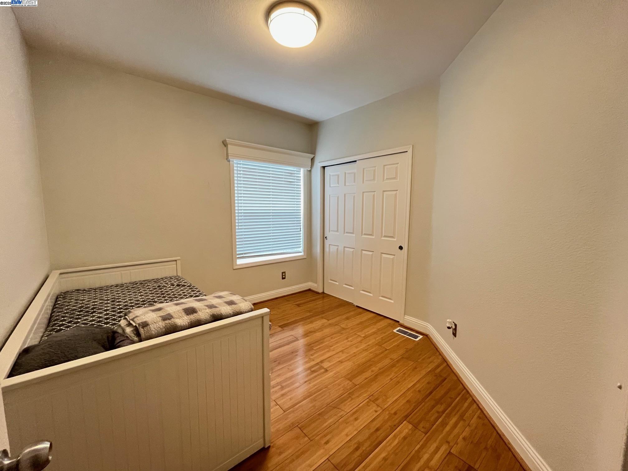 29043 Windemere Road Hayward, CA 94544 - Photo 6 of 8 a room with a bed and a window