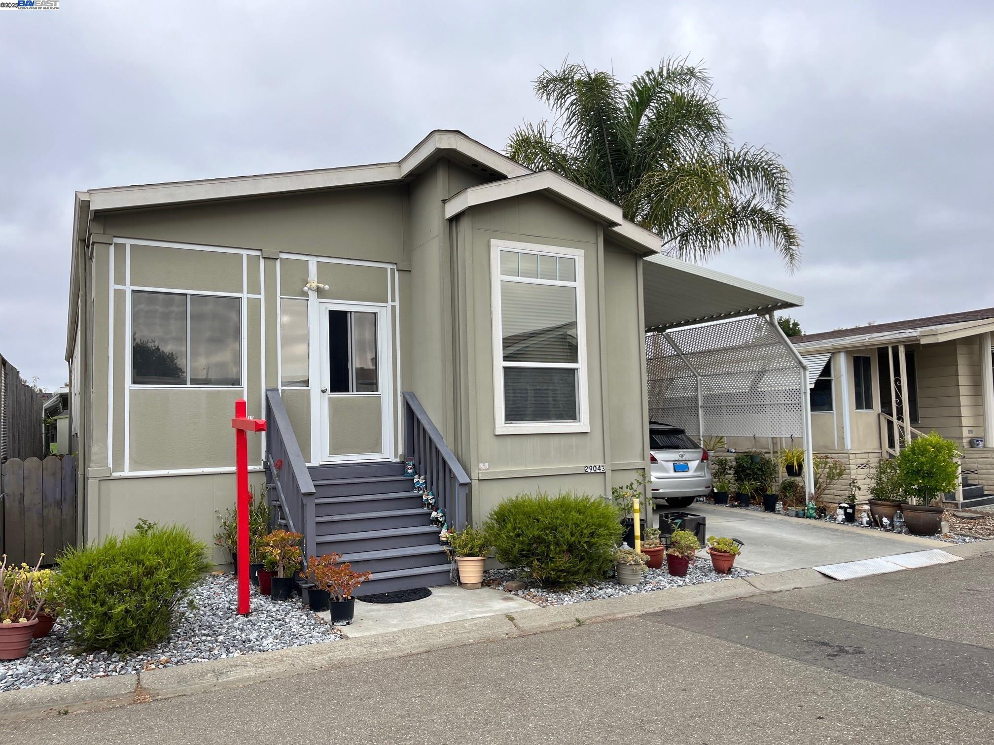 29043 Windemere Road Hayward, CA 94544 - Photo 8 of 8 a view of a house with entrance and plants