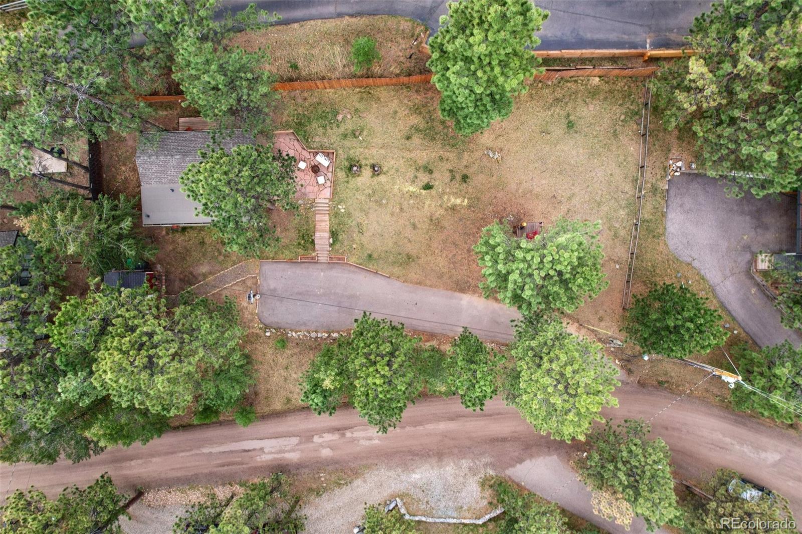 29772 Spruce Road Evergreen, CO 80439 - Photo 7 of 9 an aerial view of a house