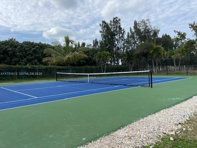 14875 Southwest 212th Street Miami, FL 33187 - Photo 22 of 80 a view of tennis court