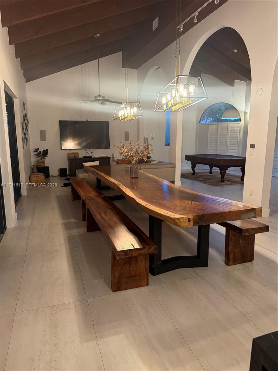 14875 Southwest 212th Street Miami, FL 33187 - Photo 50 of 80 a lobby with furniture and a flat screen tv