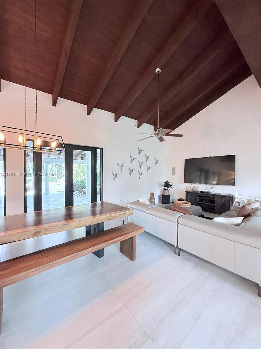 14875 Southwest 212th Street Miami, FL 33187 - Photo 54 of 80 a lobby with furniture and flat screen tv