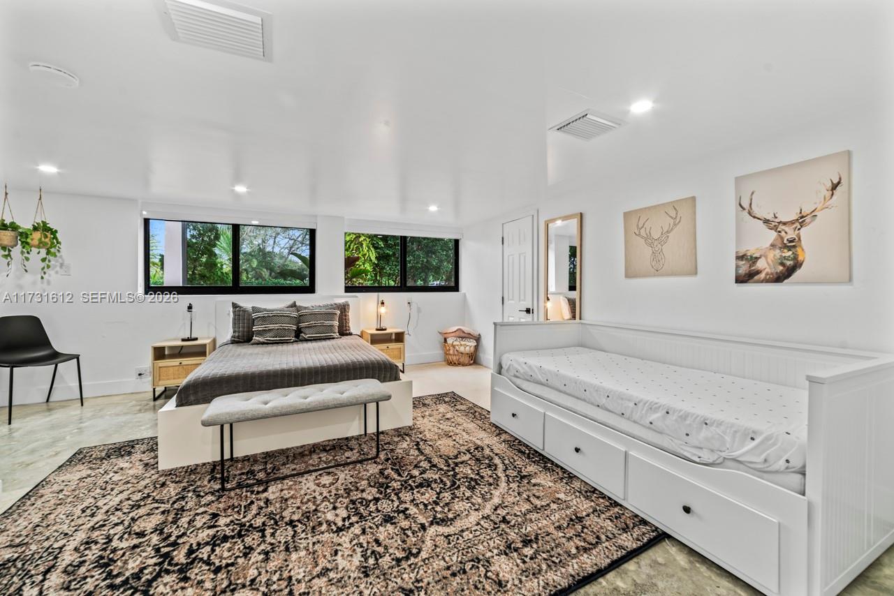 14875 Southwest 212th Street Miami, FL 33187 - Photo 66 of 80 a living room with furniture and wooden floor