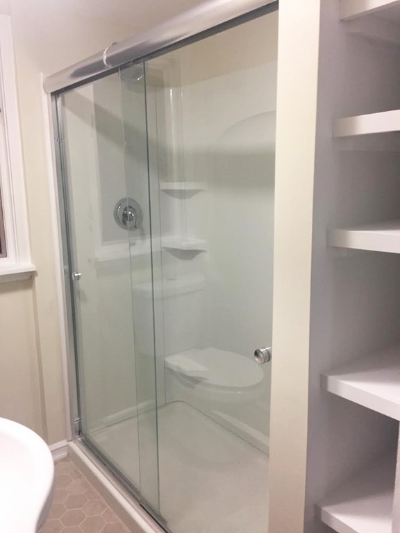 24 Mill Road Harvard, MA 01451 - Photo 14 of 26 a bathroom with a shower and toilet