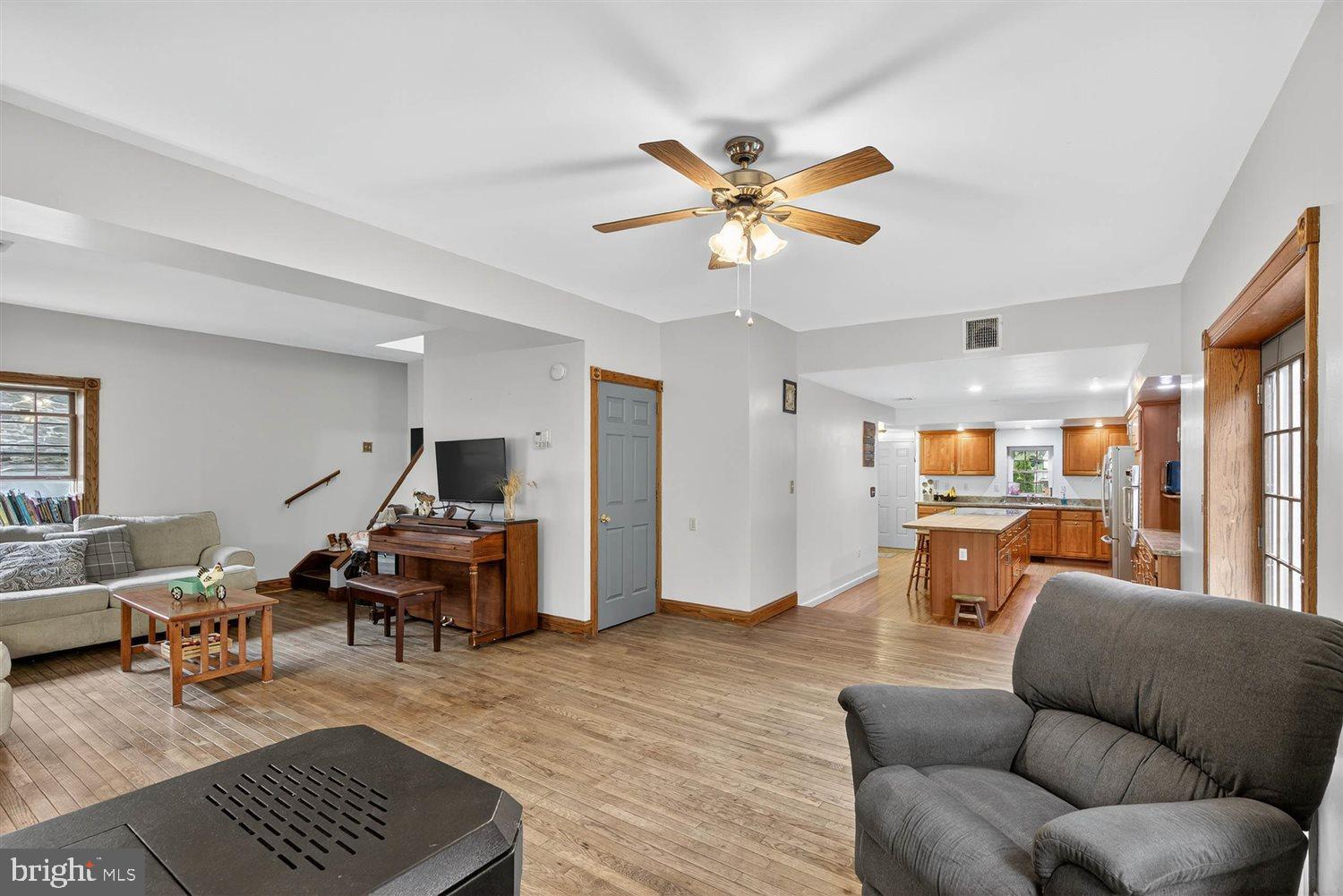 5987 River Road Conestoga, PA 17516 - Photo 12 of 40 a living room with furniture and a chandelier