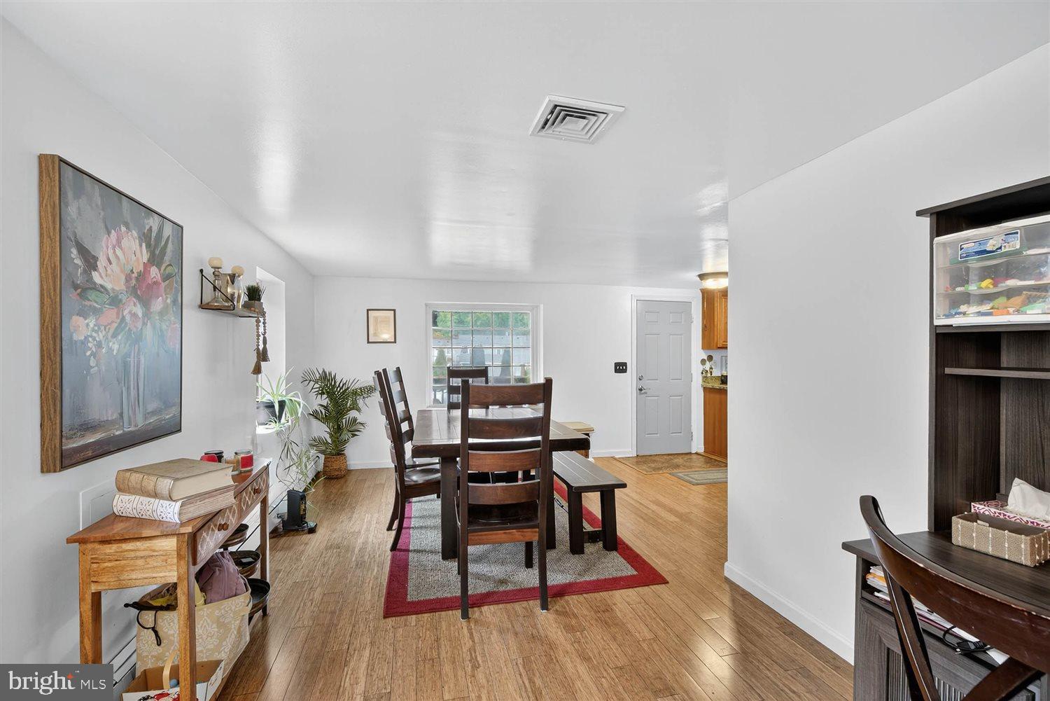 5987 River Road Conestoga, PA 17516 - Photo 17 of 40 a workspace with furniture and wooden floor