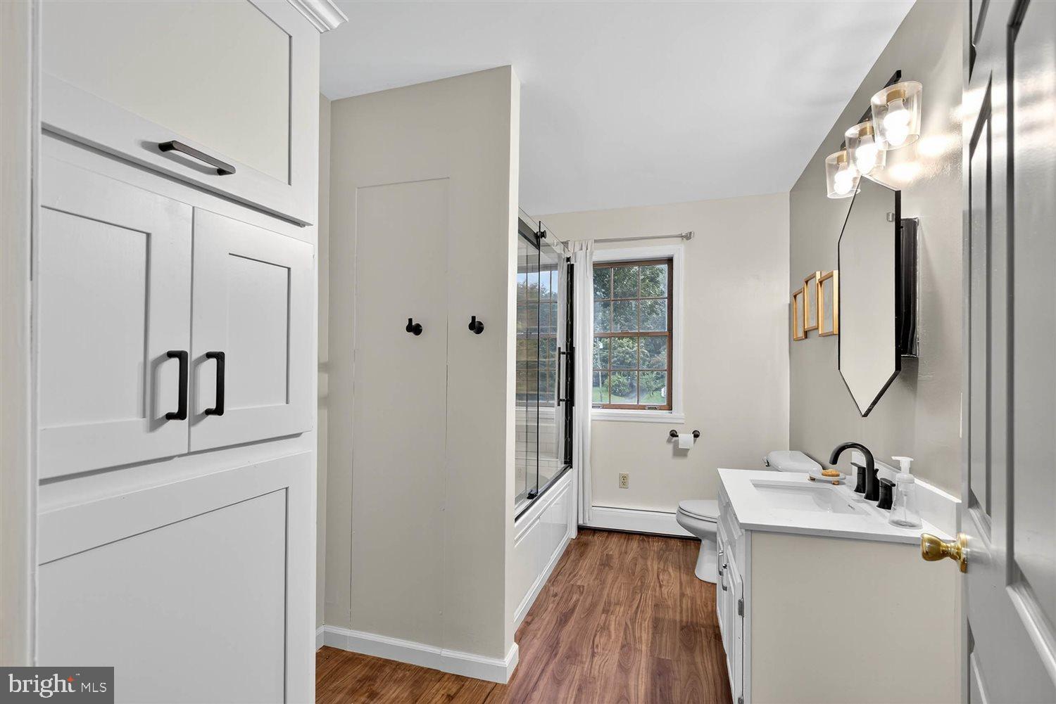 5987 River Road Conestoga, PA 17516 - Photo 26 of 40 a bathroom with a double vanity sink and mirror